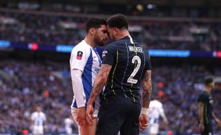 Kyle Walker, right, was lucky to remain on the pitch