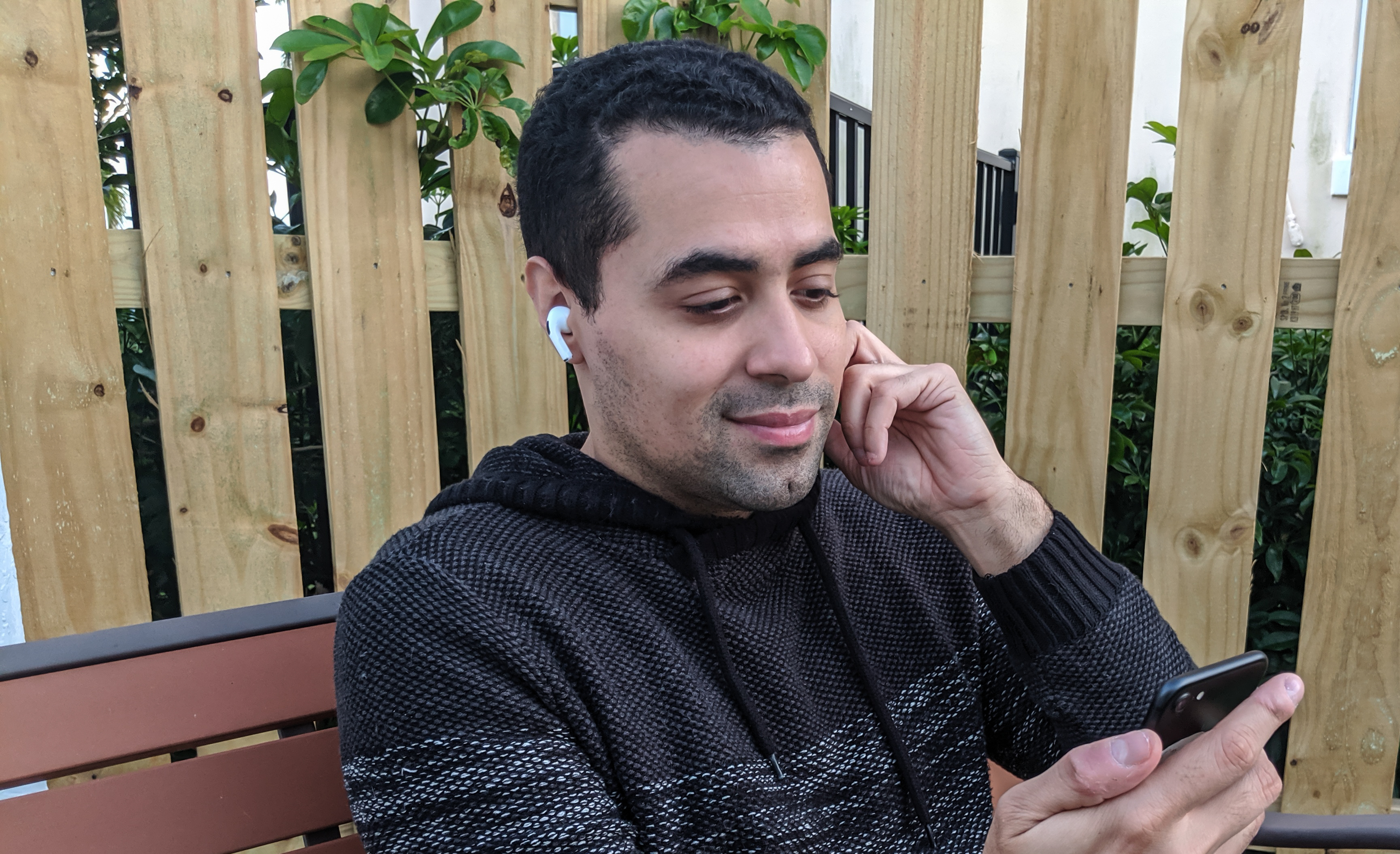 A FaceTime call being taken on the AirPods Pro