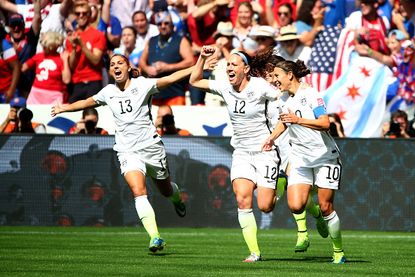 Team USA celebrates at the Women's World Cup.
