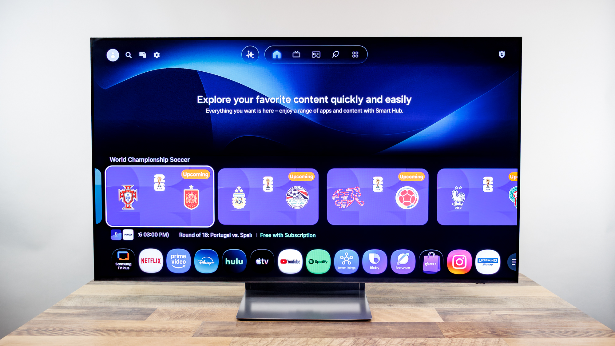 Samsung OLED S90H 4K TV on a desk