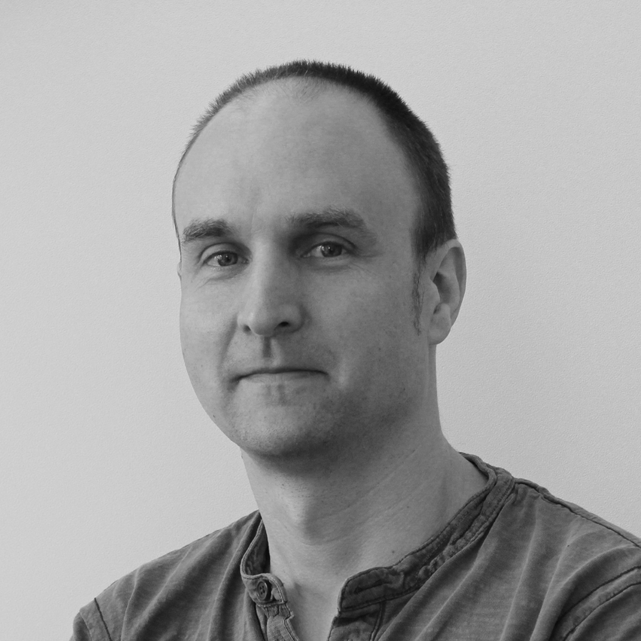 Matt Thrower against a plain background