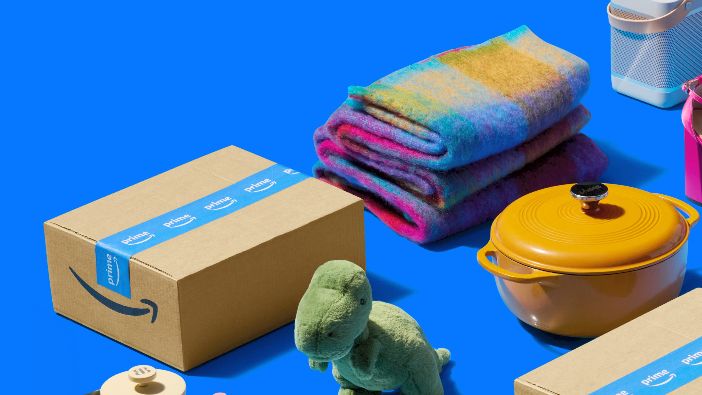 A college of products on a blue background including an Amazon package, plushy green dinosaur, yellow crockpot, multicolored blankets and a bluetooth speaker