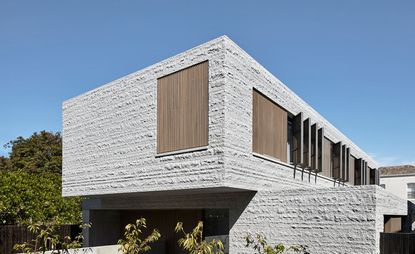 hefty granite façade home
