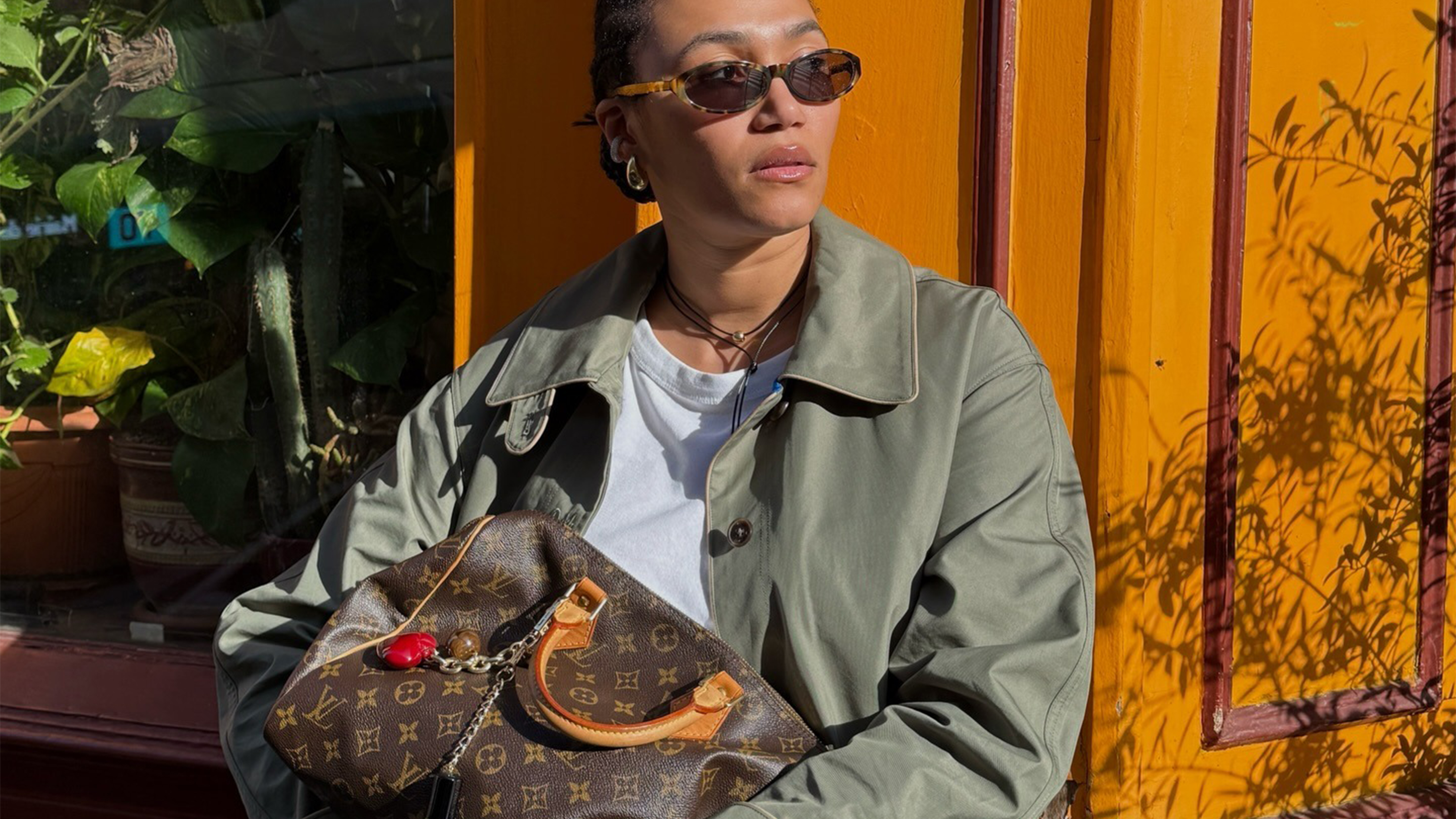 @lenafarl wearing animal-print sneakers