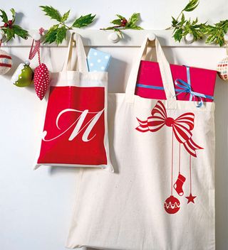 staircase with stencilled Christmas bags in red and white
