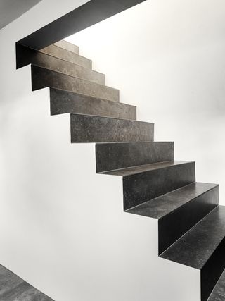 concrete staircase in a minimalist home