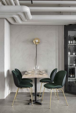 ‘Beetle’ chairs, by Gubi at Kitchen & Bar by Maanos, Helsinki, Finland