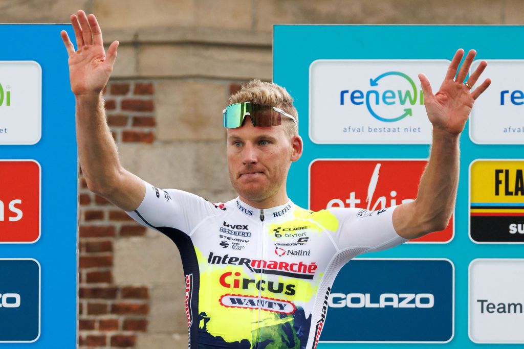 IntermarcheCircusWanty Dutch rider Mike Teunissen C celebrates on the podium after winning Stage 3 of the Renewi Cycling Tour from Aalter to Geraardsbergen 1712km in Geraardsbergen on August 25 2023 The Renewi Cycling Tour takes place from August 2327 2023 Photo by KURT DESPLENTER Belga AFP Belgium OUT Photo by KURT DESPLENTERBelgaAFP via Getty Images