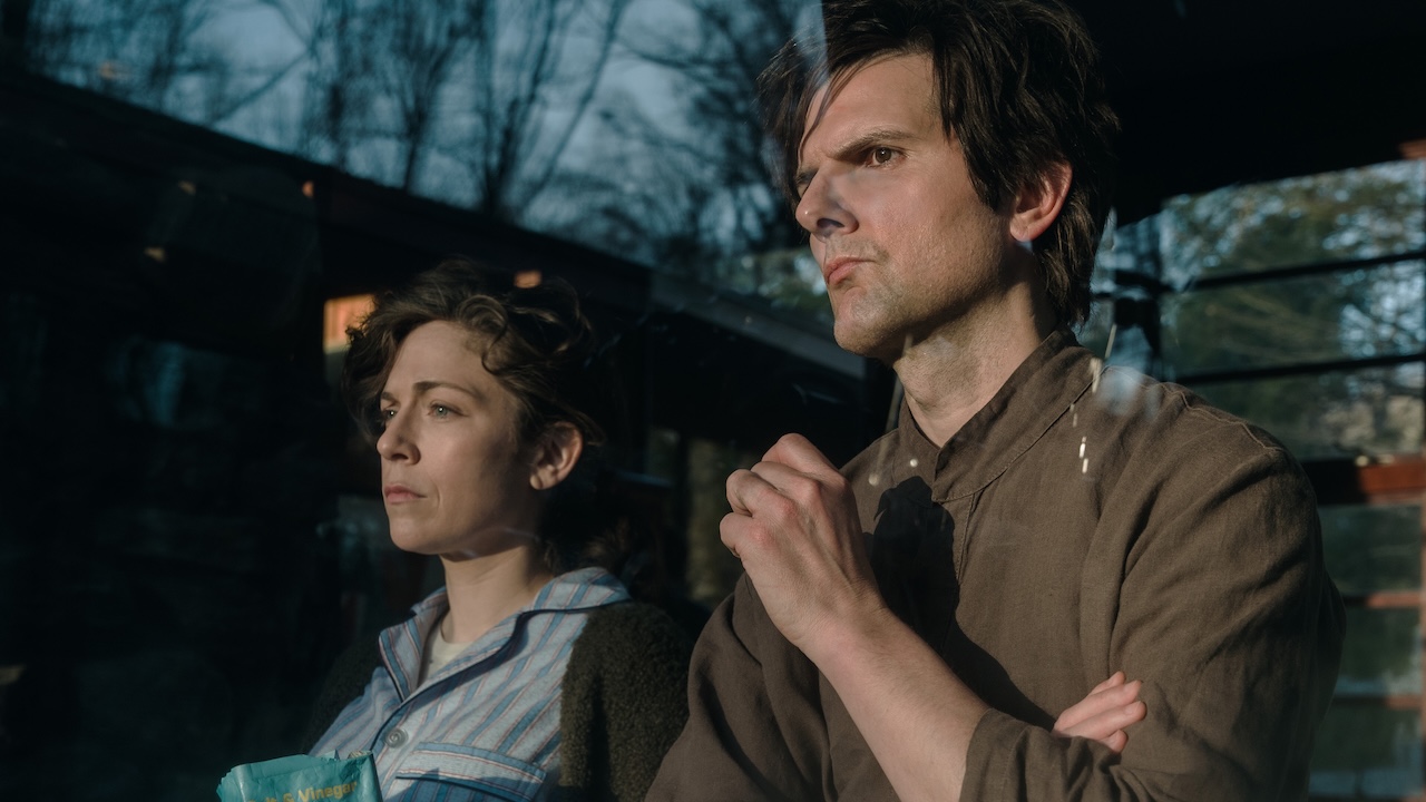 Mark and Devin standing at window in Severance series premiere