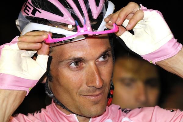 Ivan Basso gets his custom Giro d'Italia pink Rudy Projects ready