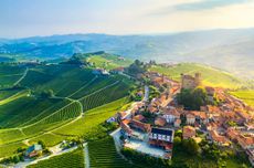 Stunning Serralunga d&rsquo;Alba, surrounded by the vine-covered hills of the Langhe region.