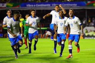 Brazil players celebrate a goal against Bolivia at the 2019 Copa America.