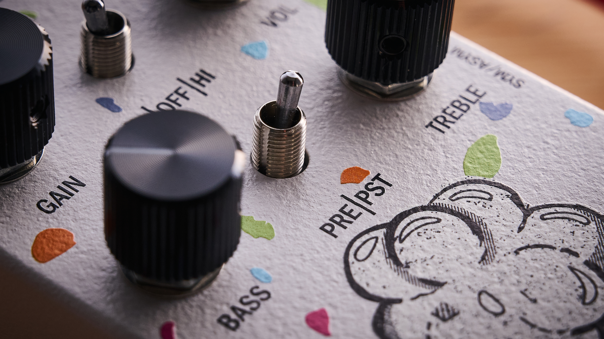 Close up of the pre/post EQ toggle switch on the Attic Audio Putty Saturation Preamp pedal