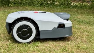 Anthbot Genie 300 robot lawn mower in reviewer's yard