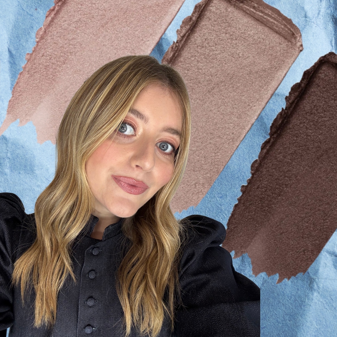 girl on a blue background with makeup swatches