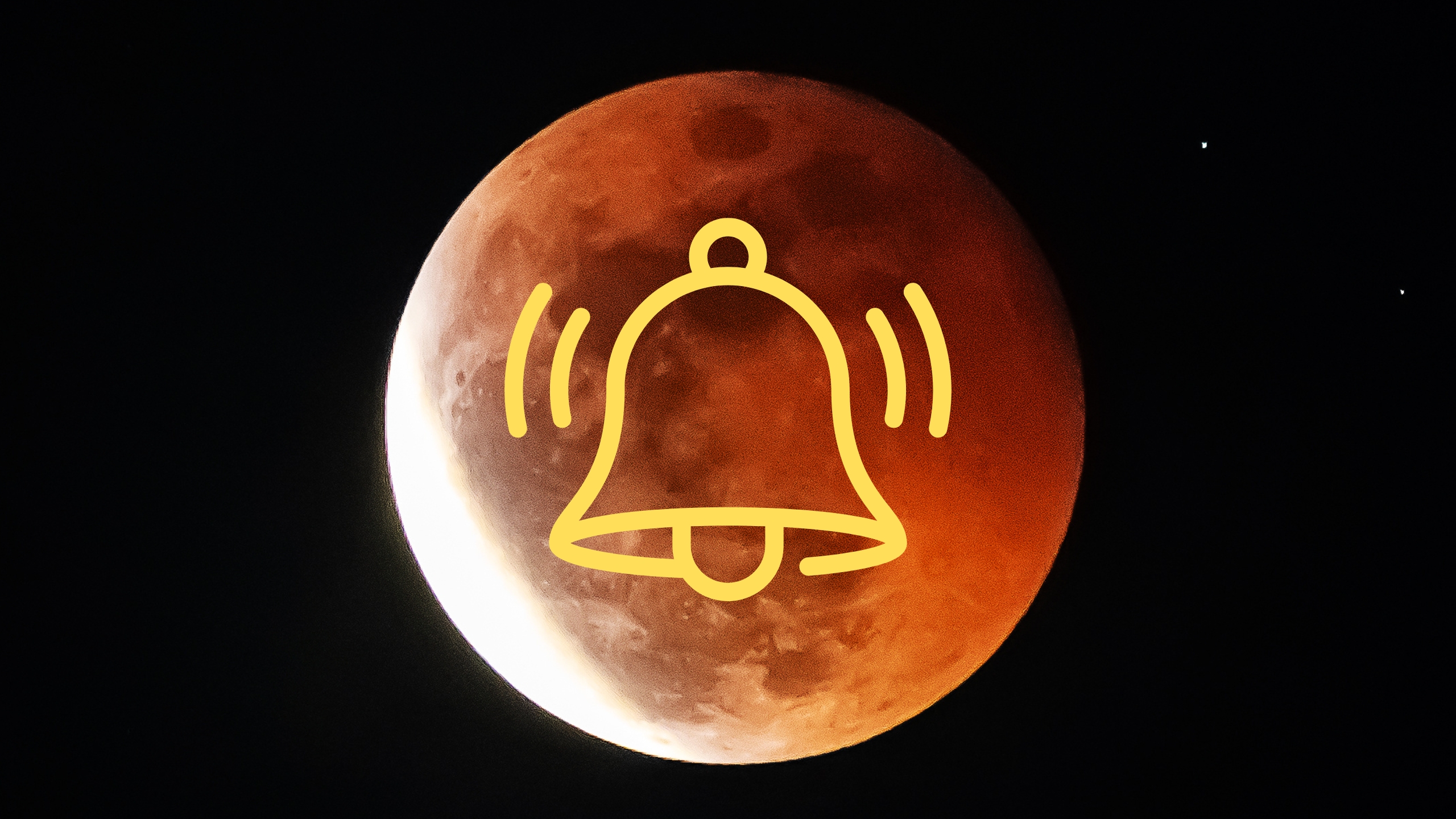 an almost full eclipsed moon with a majority of the surface appearing a rusty red hue and the lower left portion still bright white. there is a yellow notification bell graphic in the center.