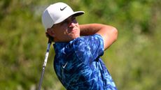 Cameron Champ holds his finish on a driver shot