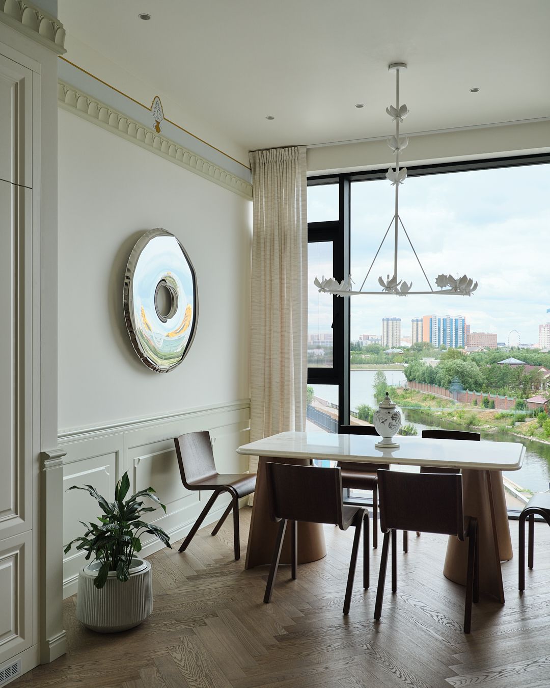A dining table in front of a window