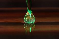 A camera captures a drop of oil levitating during an experiment at MIT.