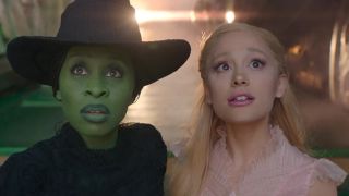 Elphaba Thropp (Cynthia Erivo) and Galinda (Arianna Grande) journey to the Emerald City to meet the "great and powerful" Wizard of Oz in Wicked.