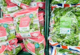 Bistro salad and Spinach in plastic packaging in Aldi supermarket, UK
