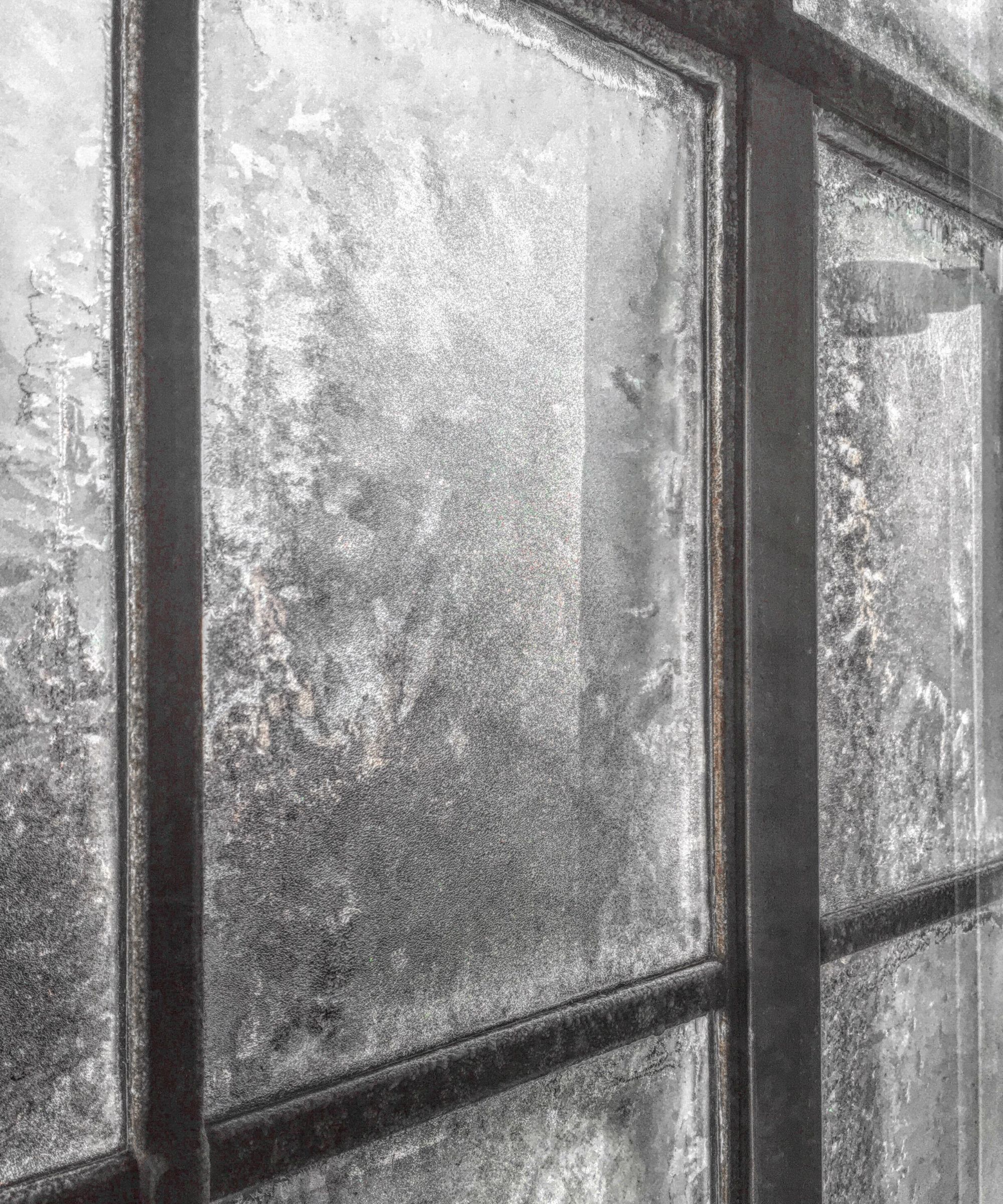 What causes frost on the inside of windows?