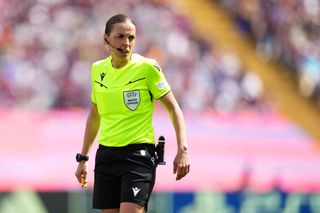 Referee Stephanie Frappart looks on during the UEFA Women's Champions League 2023/24 semi-final Leg One match between FC Barcelona and Chelsea FC at Estadi Olímpic Lluís Companys on April 20, 2024 in Barcelona, Spain