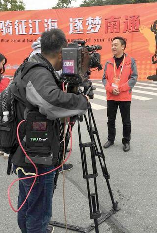 Shanghai Media Group uses a TVU One mobile IP transmitter to deliver live video coverage of the Tour of Taihu Lake Cycling Race in severe weather conditions.