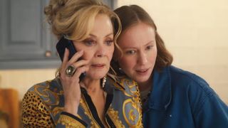 Ava leans into Deborah while she's on the phone