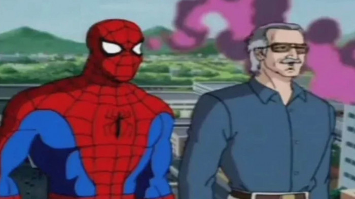 Spider-Man standing next to Stan Lee