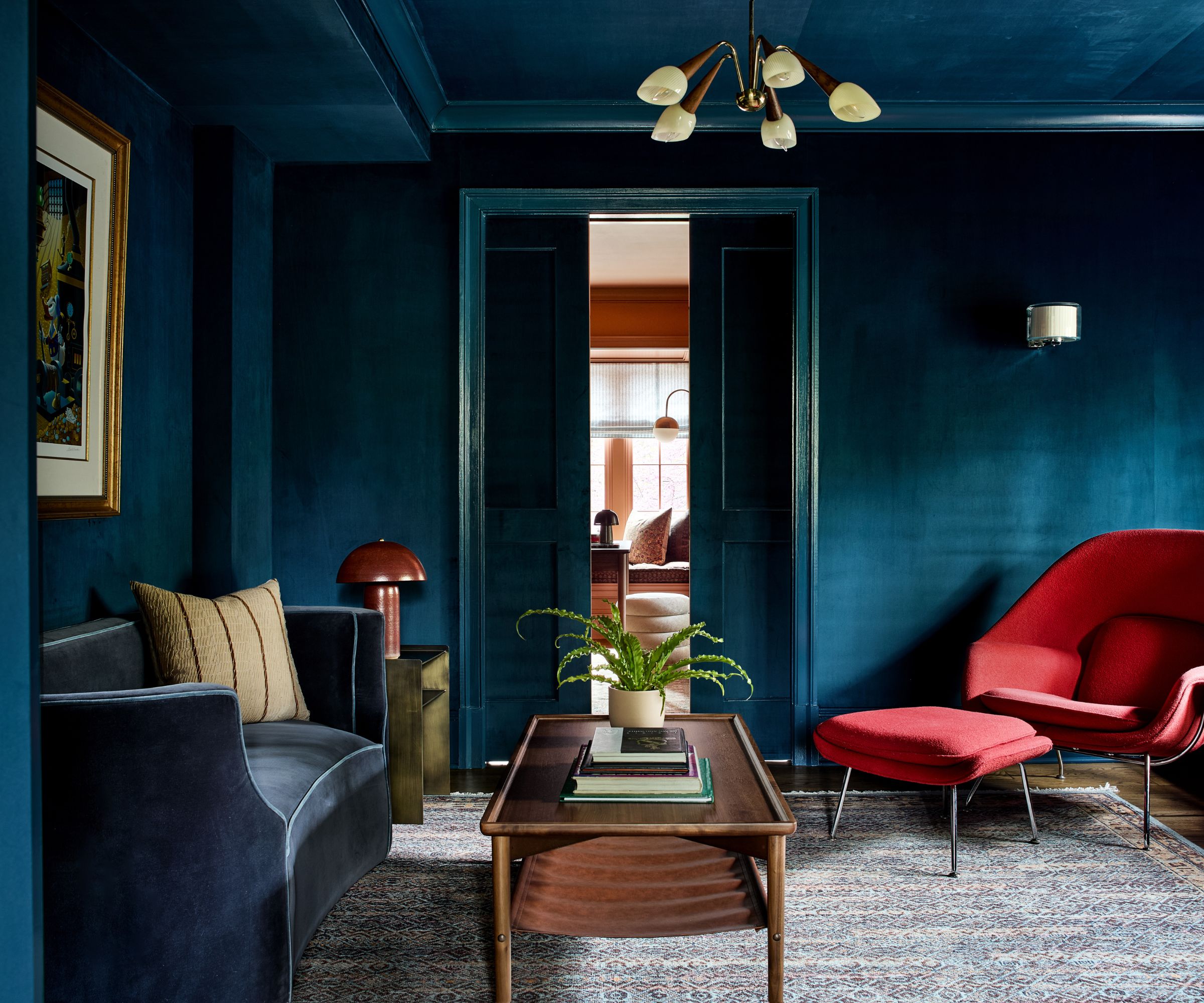Navy blue color drenched dining room