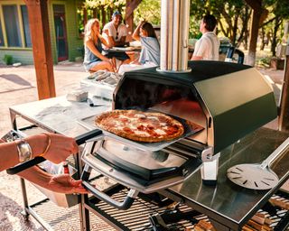 A tabletop pizza oven with multi fuel