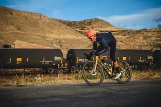 A cyclist riding a bike from the Competitive Cyclist range