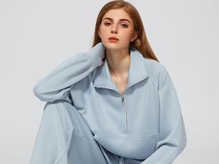 model wears light blue sweat shit