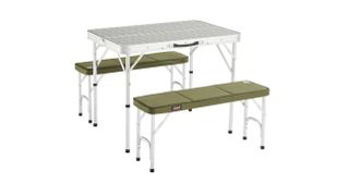 Coleman Packaway Table in solver, with two long bench seats with green cushions