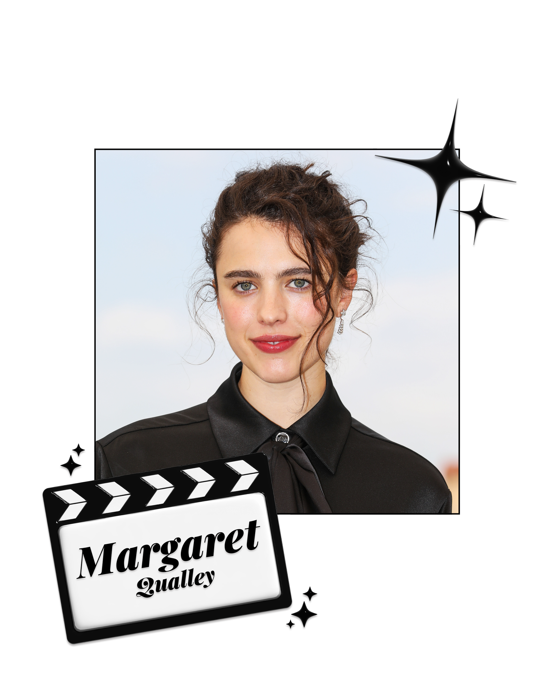 Margaret Qualley wearing a black top stands against a blue sky