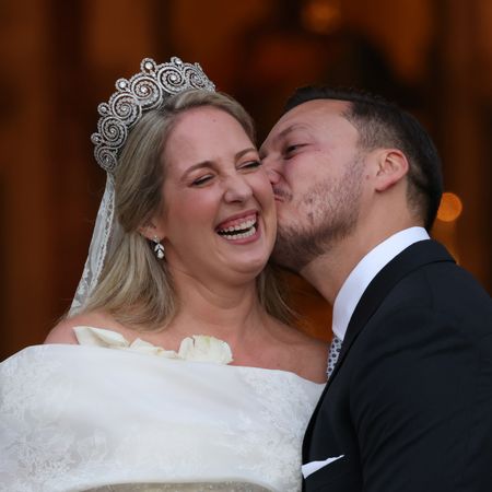 Theodora of Greece and Matthew Kumar kiss following their wedding ceremony at the Cathedral of the Annunciation of St. Mary in Athens, Greece on September 28, 2024