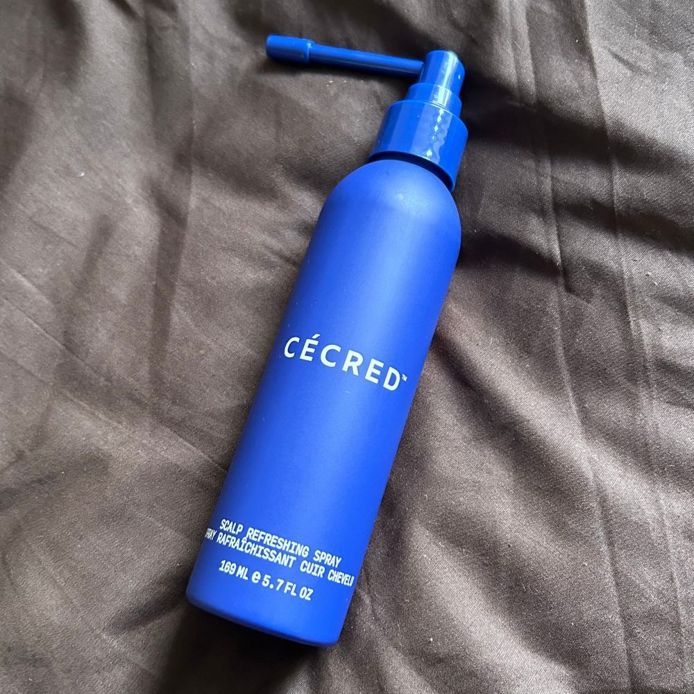 A close-up shot of Cécred's Scalp Refreshing Spray