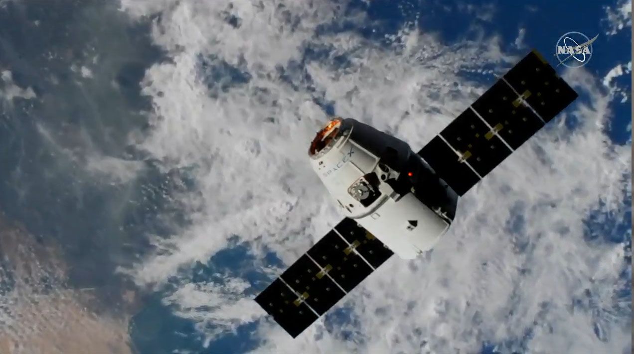 A SpaceX Dragon cargo ship carrying over 5,700 lbs. (2,585 kilograms) of science gear and NASA supplies arrives at the International Space Station on Dec. 8, 2019 during the CRS-19 cargo mission.