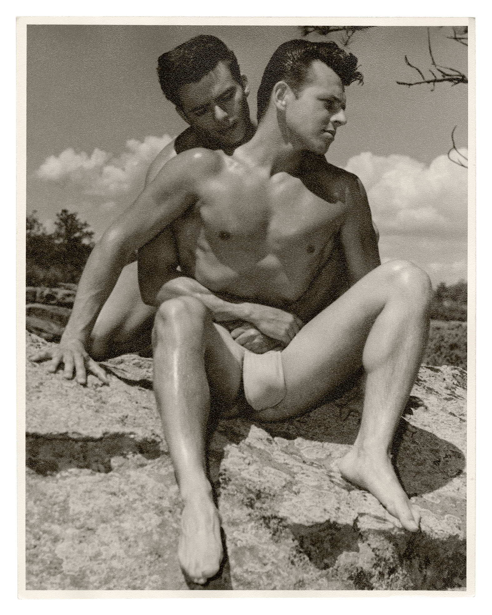 black and white image of naked men