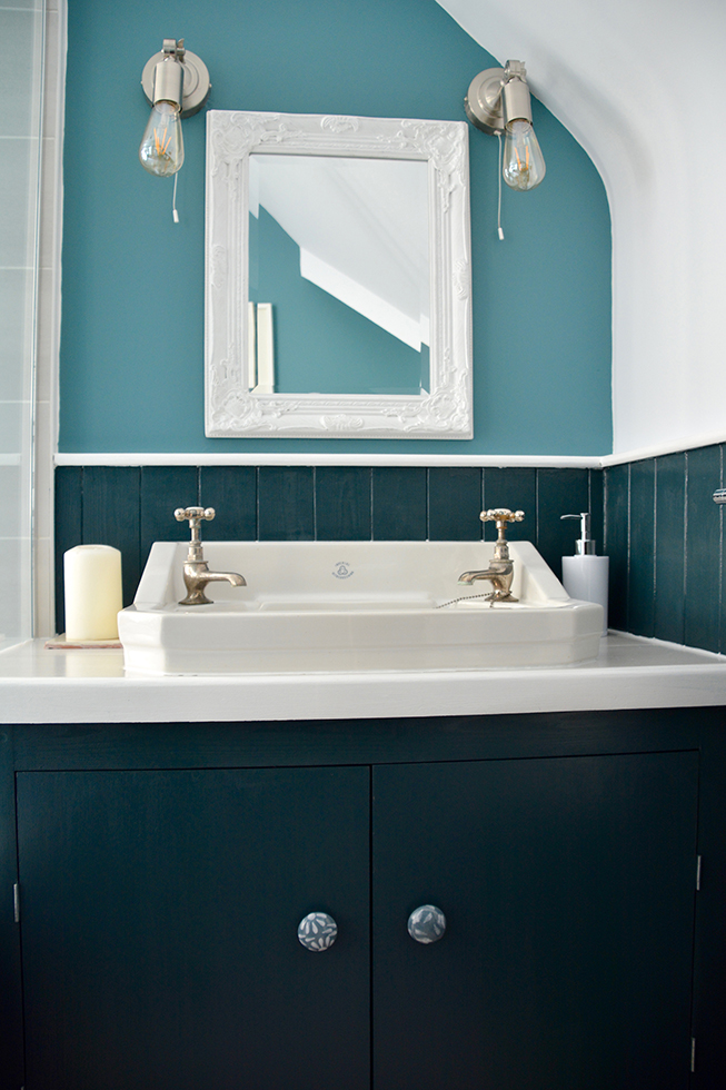 bathroom with sloping ceiling