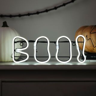 A white neon sign that says 'Booo'