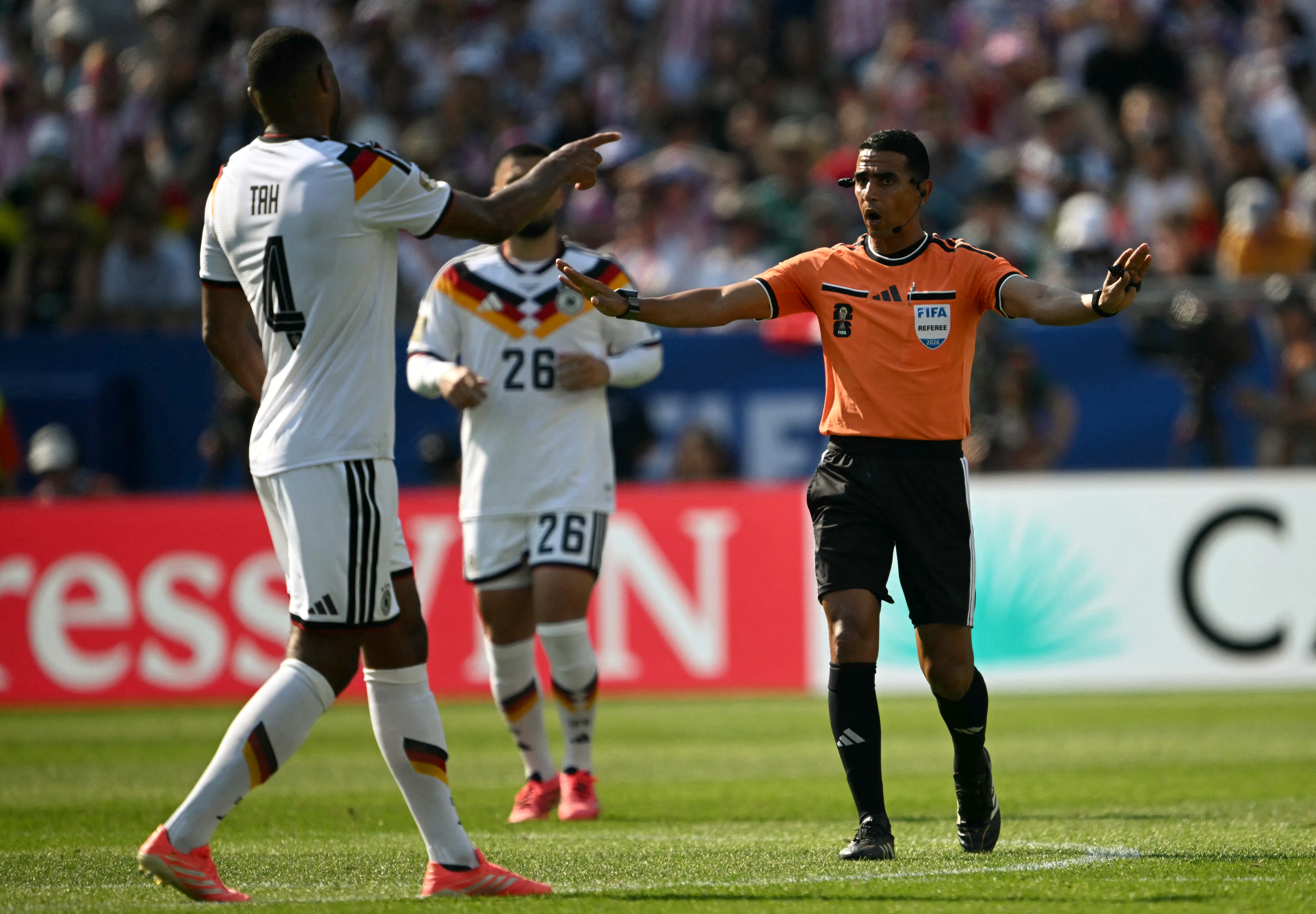 Moroccan referee Jalal Jayed gestures during the 2026 World Cup round of 32 football match between Germany and Paraguay at the Boston Stadium in Foxborough on June 29, 2026.  (Photo by MAURO PIMENTEL / AFP)