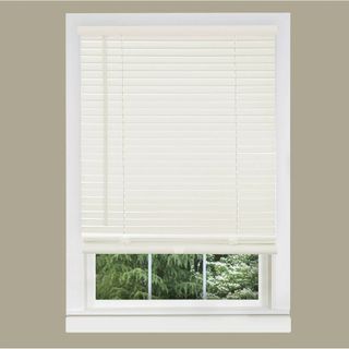 A sash window with venetian blinds