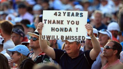 A patron holds a sign during the final round of The Honda Classic at PGA National Resort And Spa on February 26, 2023 in Palm Beach Gardens, Florida
