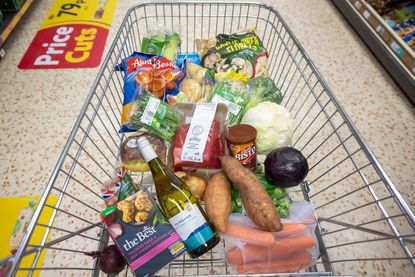 Supermarket trolley filled with food