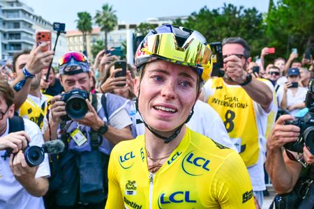FDJ-SUEZ's Dutch rider Demi Vollering, wearing the overall leader's yellow jersey, reacts after winning the 9th and final stage of the fifth edition of the Women's Tour de France cycling race, 99.2 km from Nice to Nice, southeastern France on August 9, 2026. (Photo by NICOLAS TUCAT / AFP via Getty Images)