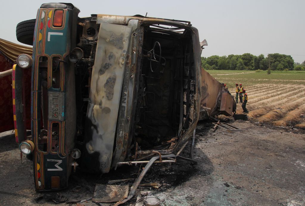 Rescue workers deal with the aftermath of an oil tanker explosion in Pakistan