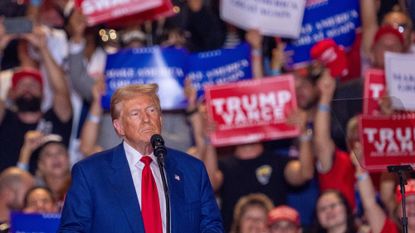 Former US President and Republican presidential candidate Donald Trump arrives to speak at a campaign rally in Uniondale, New York, on September 18, 2024