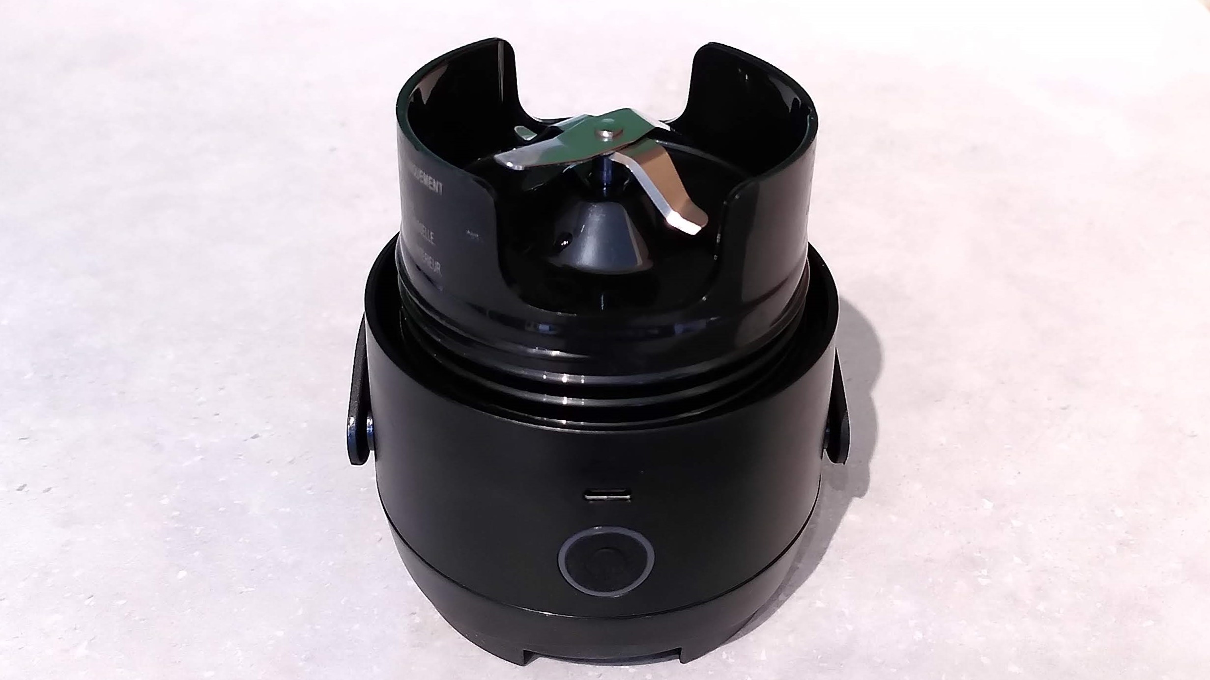 Nutribullet Flip blending cap upside down, showing blades